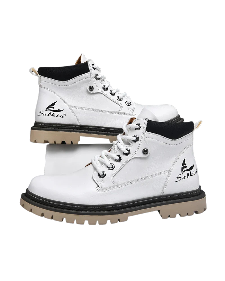 Bottes homme classiques en cuir, design élégant et confort optimal. Semelle résistante. Idéales casual/formel.