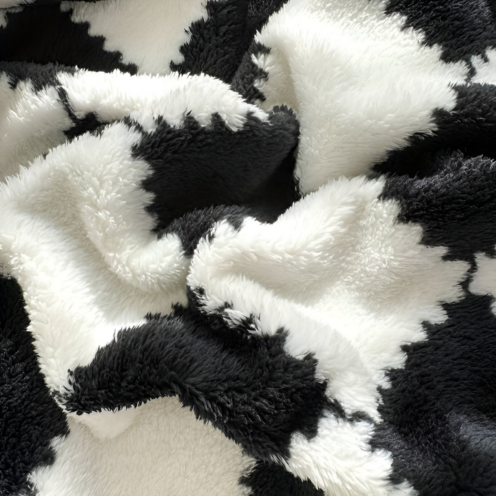 Plaid SnugFuz à carreaux multicolores, en flanelle douce et respirante, chaleur et confort garantis.