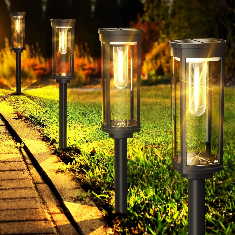 Éclairage solaire extérieur pour allée et jardin, lumière LED sans fil, crée une ambiance chaleureuse et lumineuse.