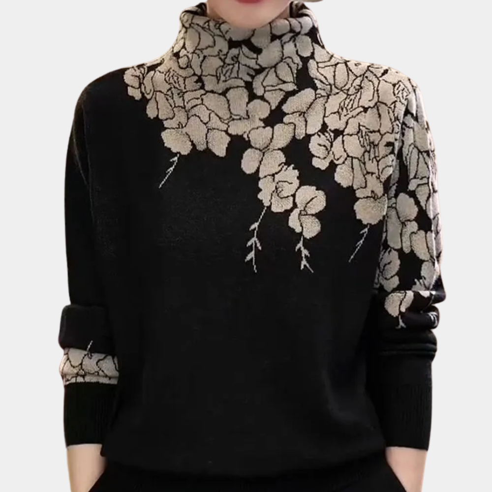 Pull femme col roulé doux motif floral élégant, idéal mode hiver pour un look raffiné et confortable.