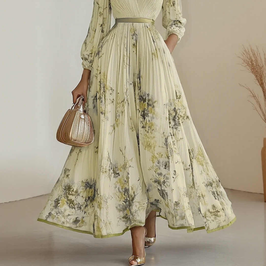 Adoptez l'élégance fluide avec la robe midi Elara femme, col V, sans manches, parfaite pour l'été chic.