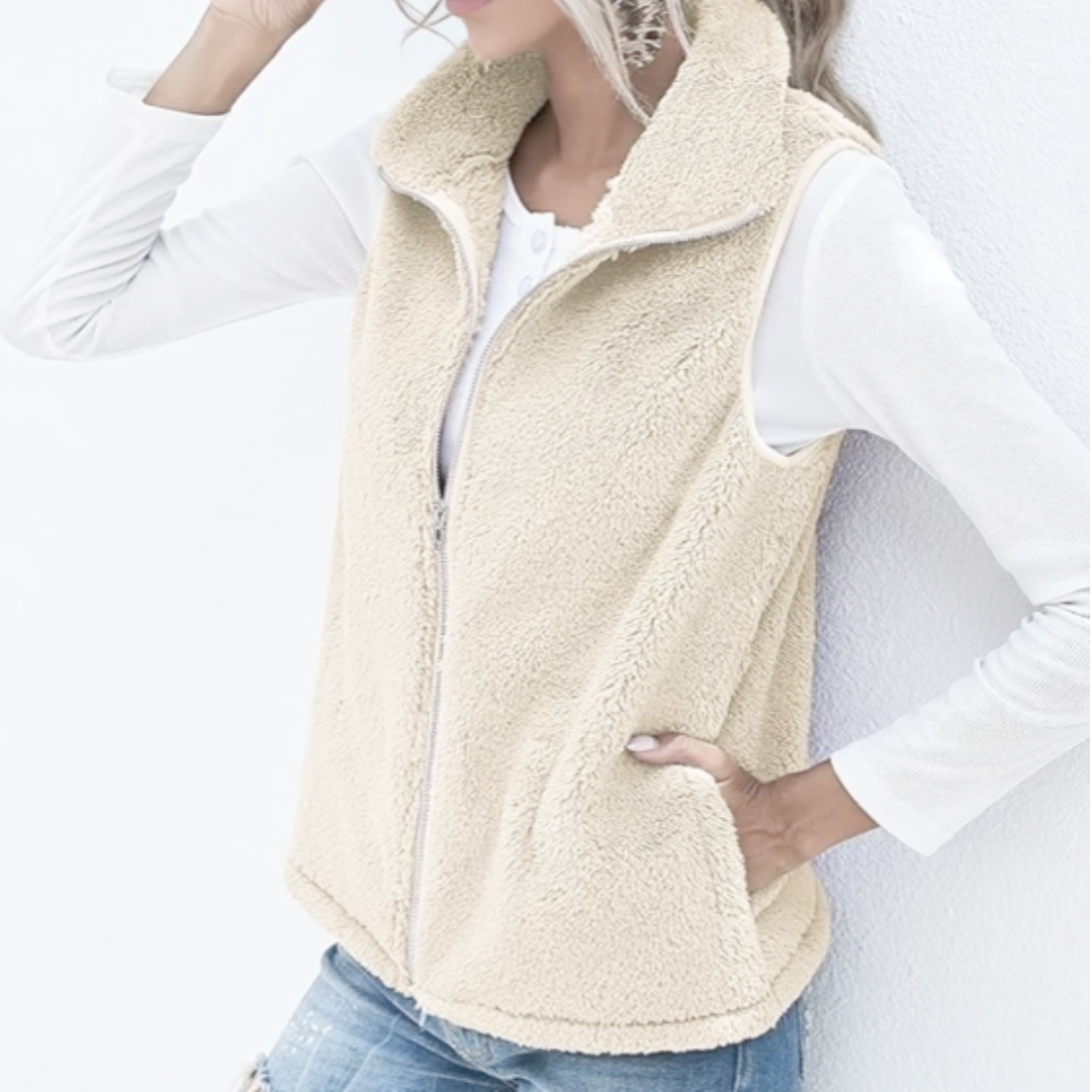 Gilet femme teddy doux et chaud à zip intégral pour l'hiver. Confortable et élégant, parfait pour le cocooning.