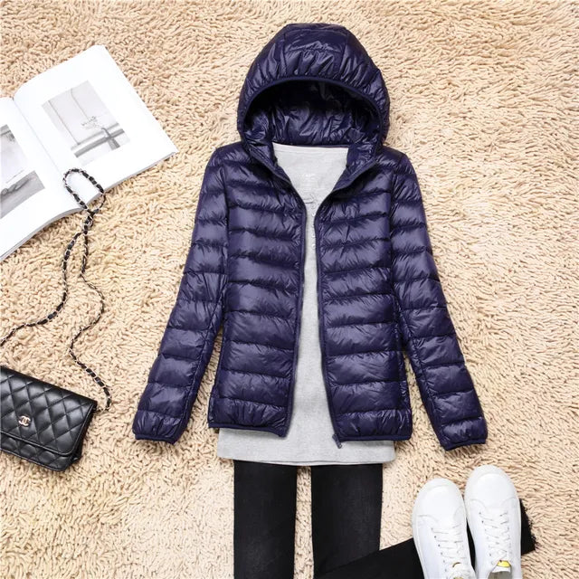 Manteau femme léger et chaud, parfait pour les déplacements. Style contemporain chic.