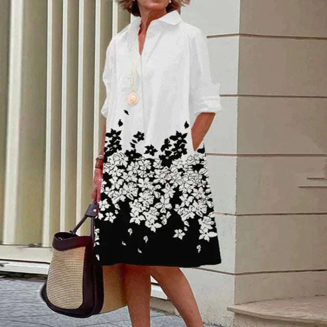 Robe midi casual pour femme, avec poches discrètes, idéale pour un style printanier décontracté.