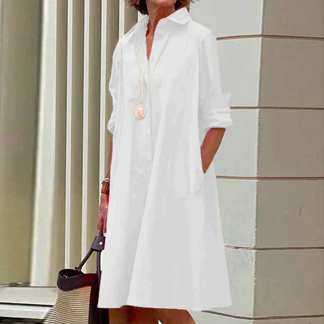 Robe midi décontractée femme avec poches, parfaite pour les journées estivales et printanières.