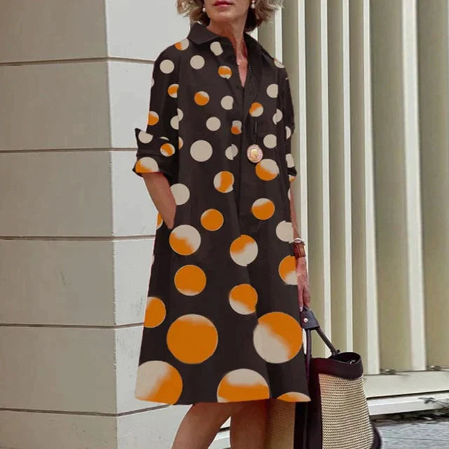 Robe midi femme, coupe décontractée et poches pratiques, un choix confortable pour l'été.