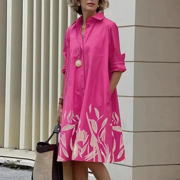 Robe midi femme décontractée et stylée, dotée de poches, pour un confort estival garanti.