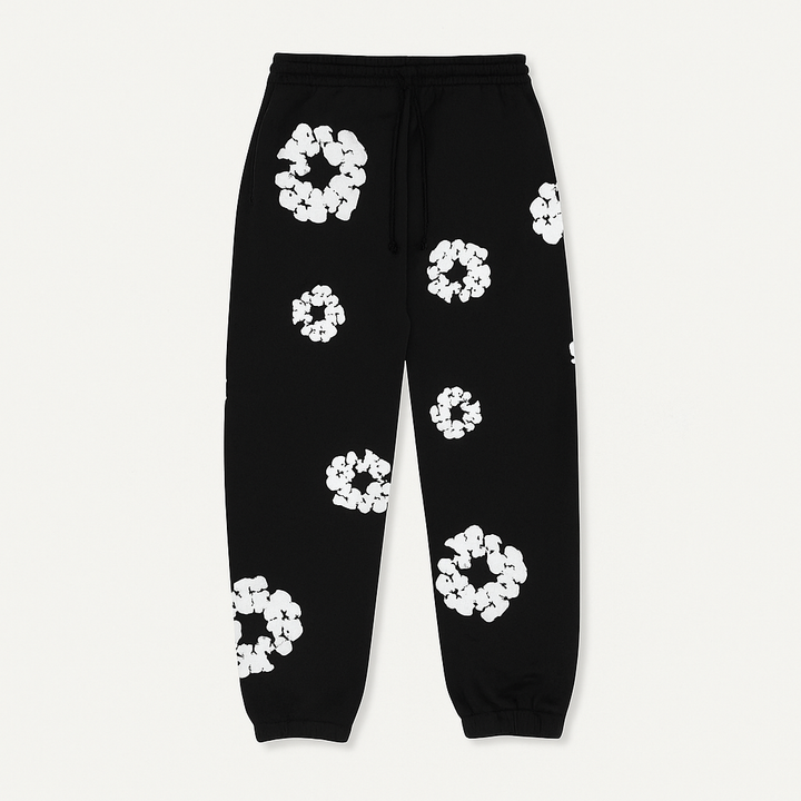 Haut de survêtement homme floral, col zippé, style streetwear moderne. Parfait pour un look décontracté printanier.