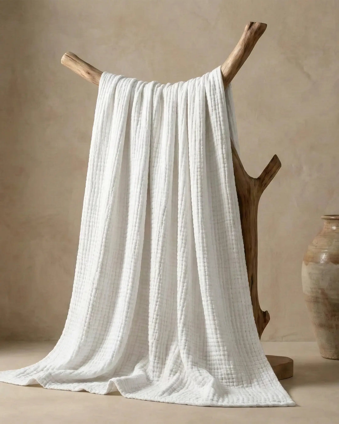 Jeté de canapé en coton, confortable et respirant, idéal pour une décoration naturelle et douce.