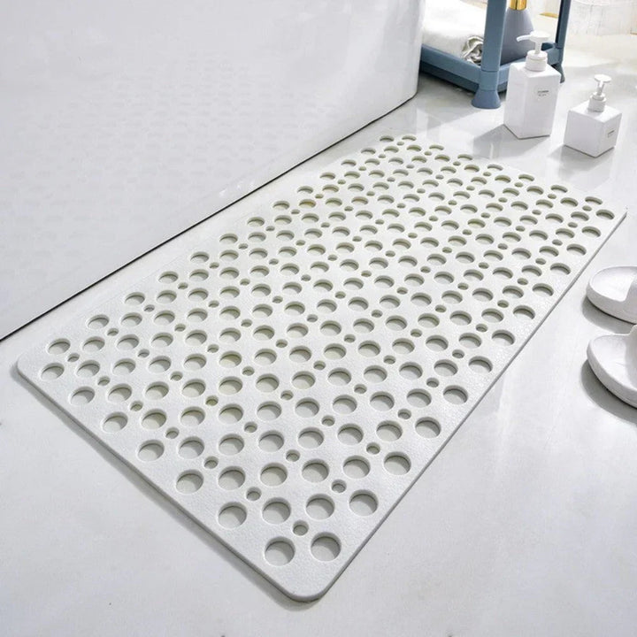 Confortable tapis de douche antidérapant avec ventouses, idéal pour la sécurité sous la douche, facile d'entretien.