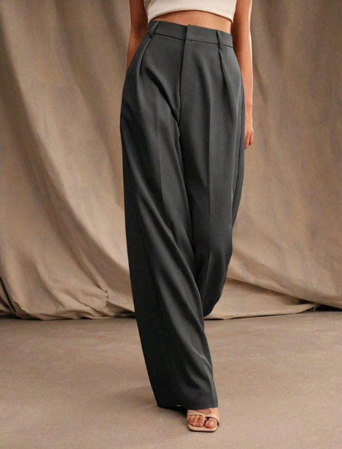 Pantalon large femme taille haute, plissé pour confort et style chic. Idéal garde-robe féminine.
