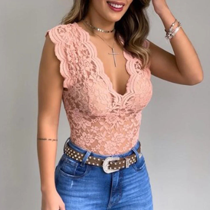 Haut femme chic avec col V, manches courtes, parfait pour un look féminin mode, décontracté ou habillé.