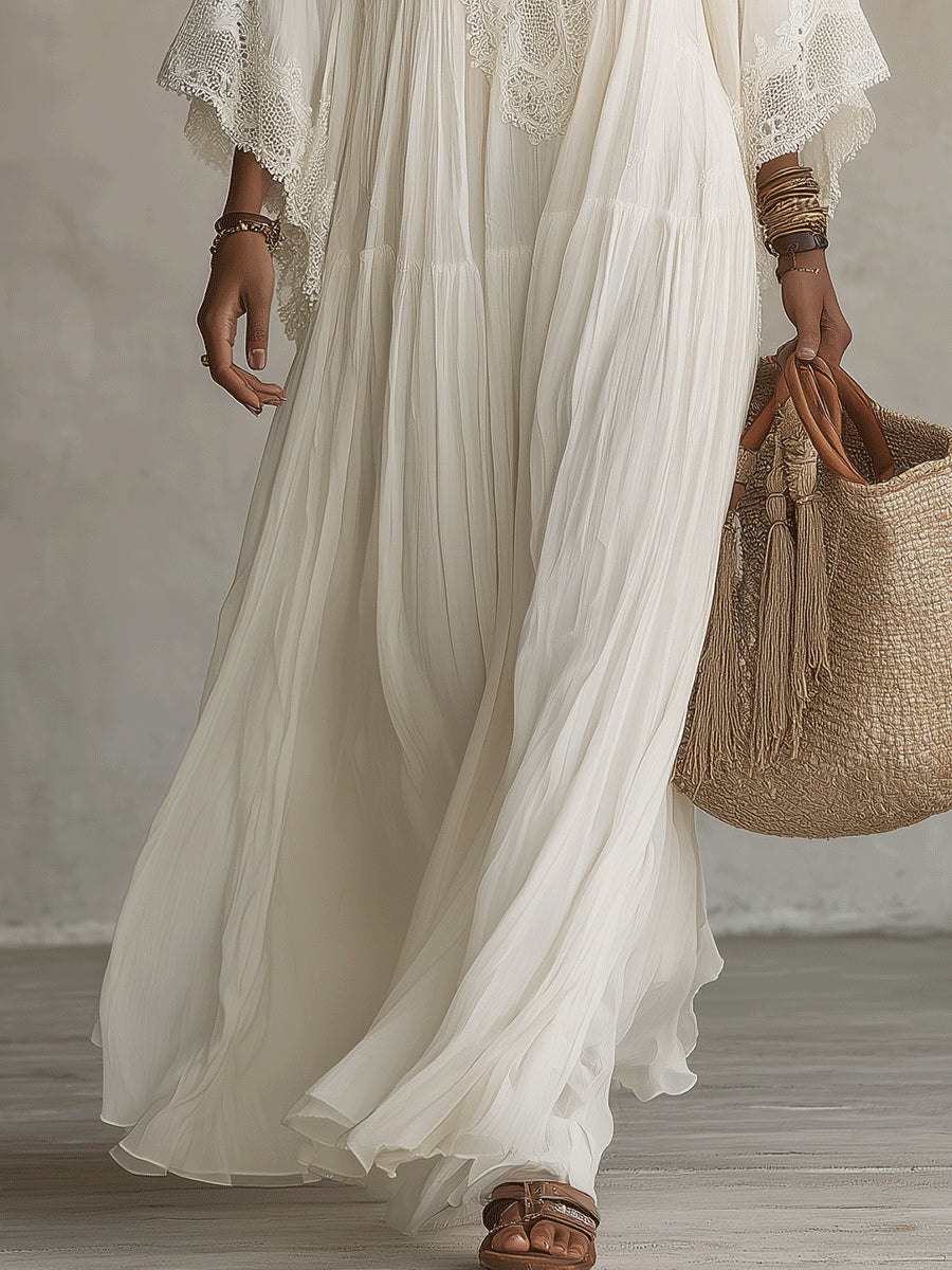 Robe longue d'été femme bohème chic, légère et fluide. Détails dentelle, idéale pour la plage ou les journées décontractées.