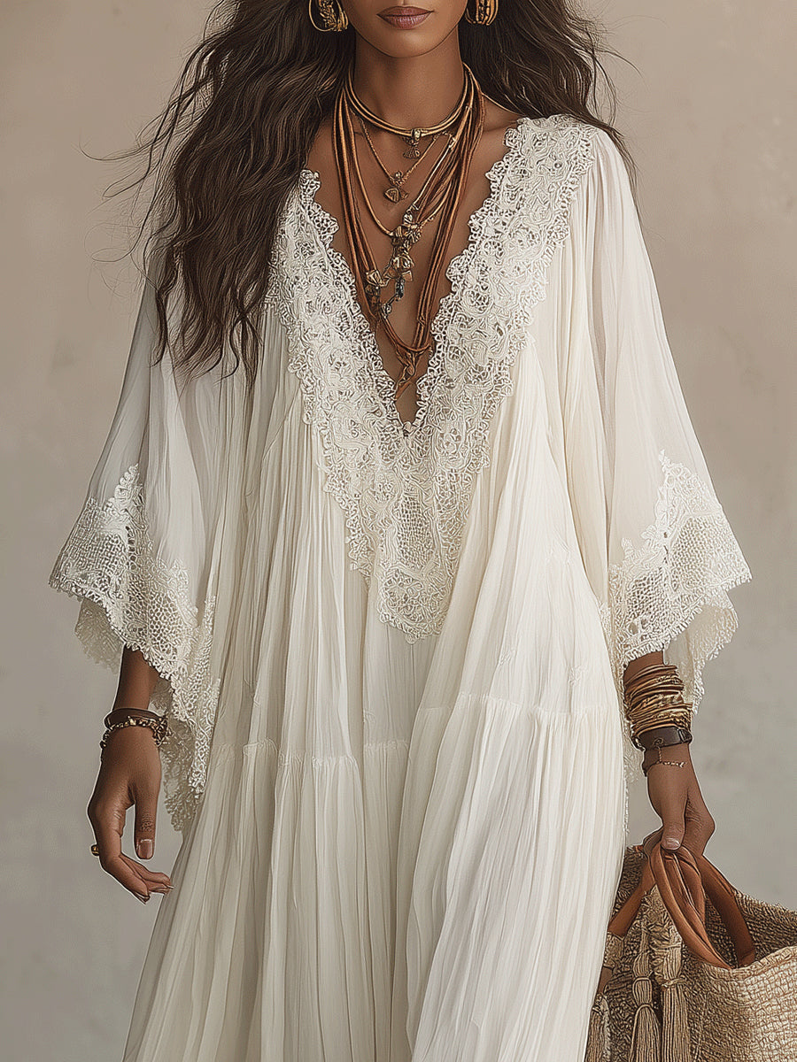 Robe romantique femme, coupe longue et fluide, détails en dentelle. Style bohème élégant pour l'été et les vacances.