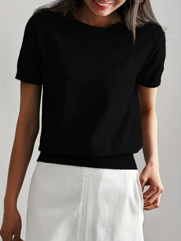 Pull de printemps-été pour femme, manches courtes et coupe décontractée, élégant et confortable.