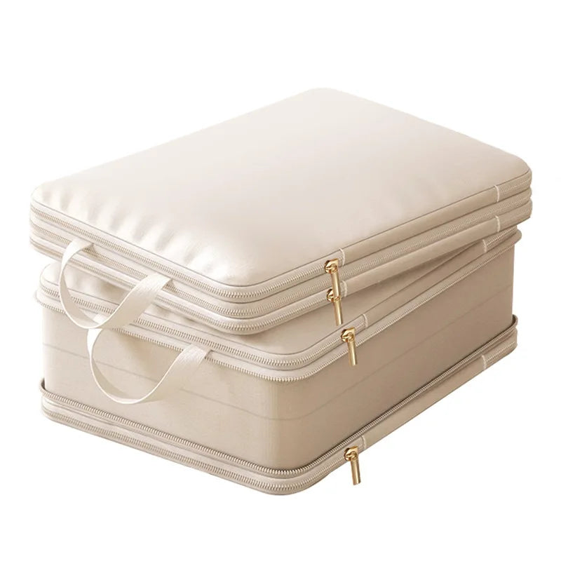 Sac de voyage compact et compressible pour vêtements. Réduit le volume et organise efficacement l'intérieur du bagage.