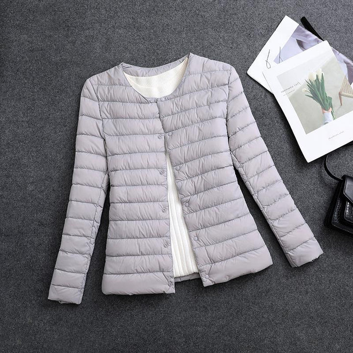 Veste femme isolante chaude, douce et légère. Col rond, confort décontracté en hiver.