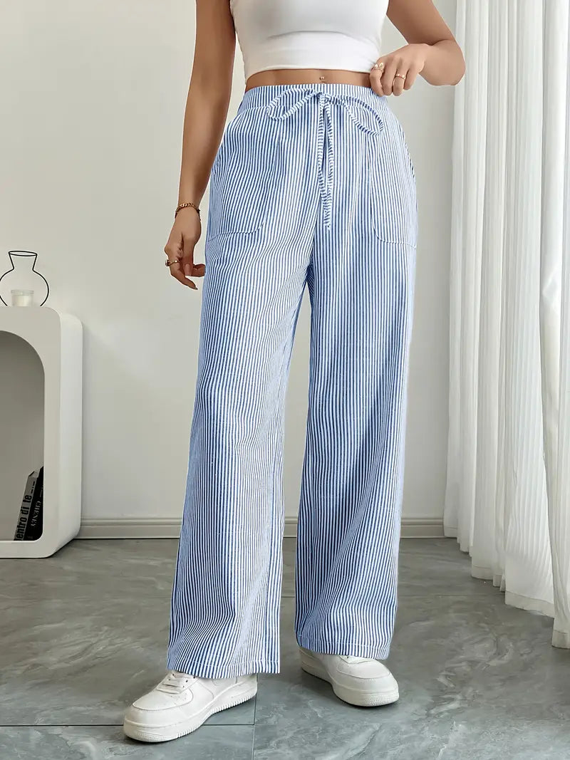 Pantalon femme fluide, rayures verticales, poches pratiques.