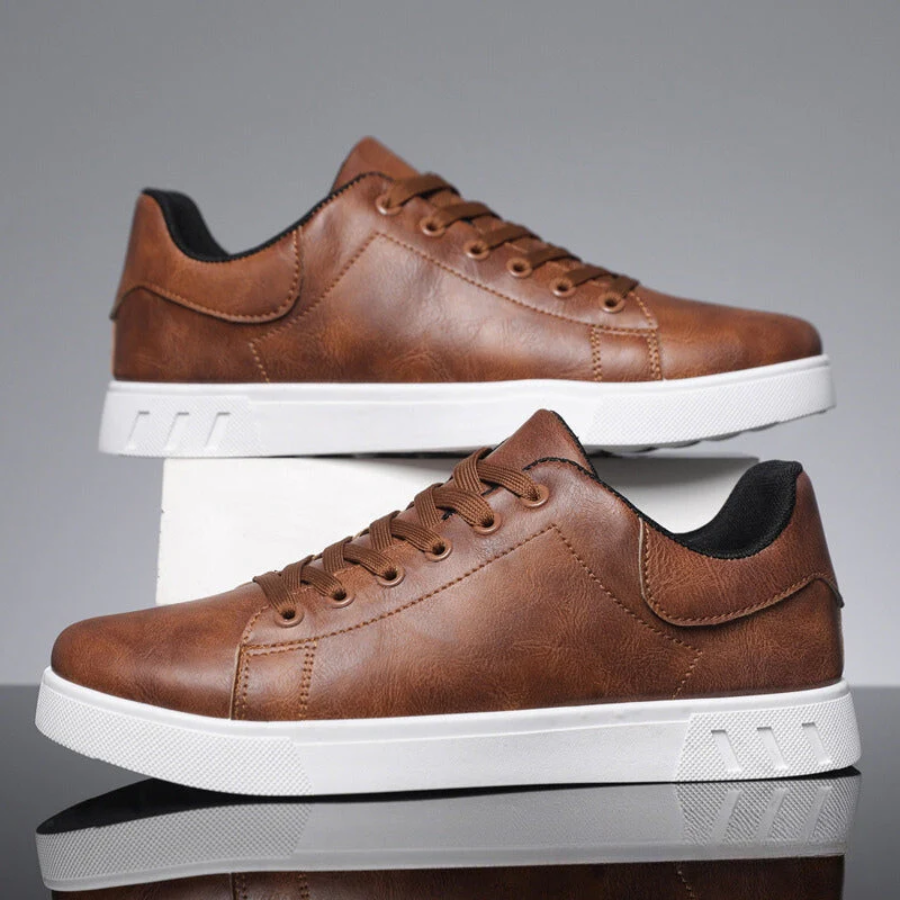 Baskets homme décontractées à lacets, idéales pour le quotidien. Confort et style urbain garantis.