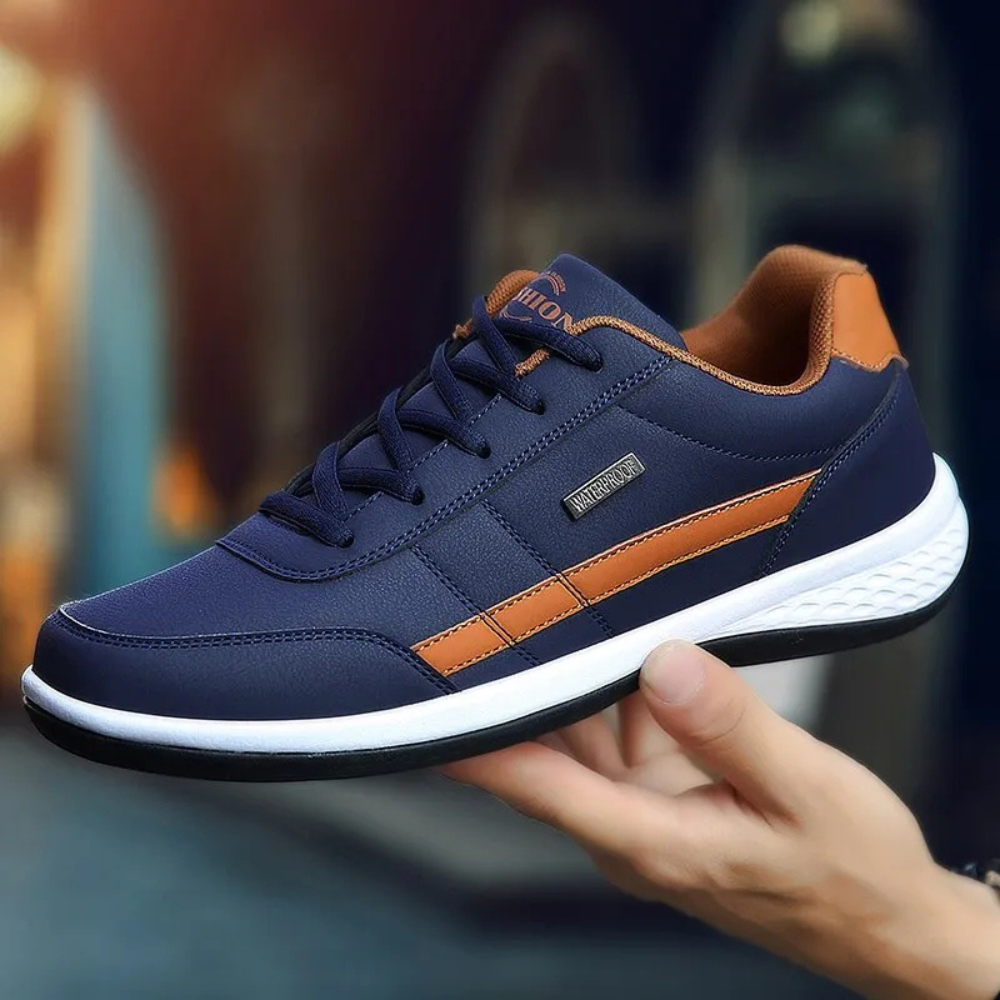 Semelle amortie de baskets homme, garantissant un soutien équilibré et un confort durable pour toutes activités.