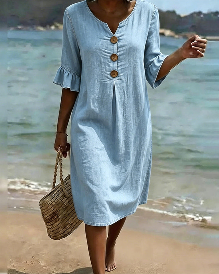 Robe femme estivale, manches volantées aériennes, coupe fluide trapèze. Parfaite pour toute occasion.