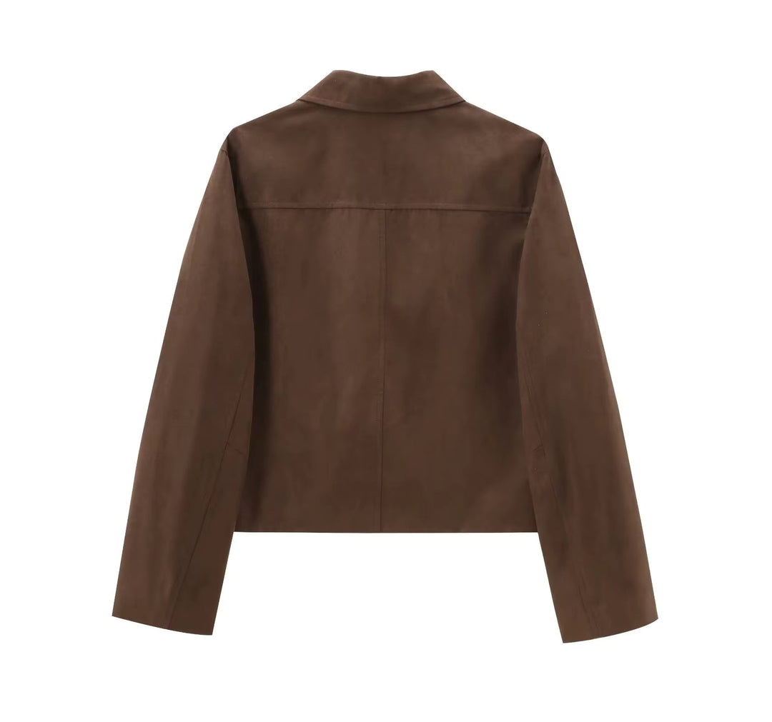Blazer femme élégant à boutons, veste chic décontractée, coupe raffinée pour bureau et mode féminine.