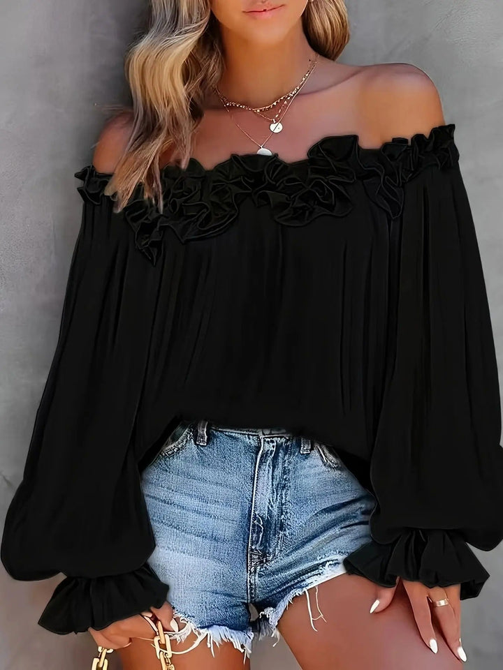 Top féminin élégant à épaules dénudées, manches longues. Blouse chic blanc/noir, parfaite pour la mode printemps-été.