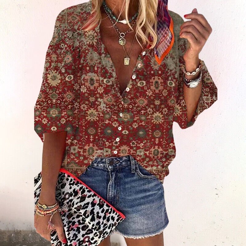 Blouse femme élégante à motifs imprimés. Manches trois-quarts pour look mode printemps/été décontracté.