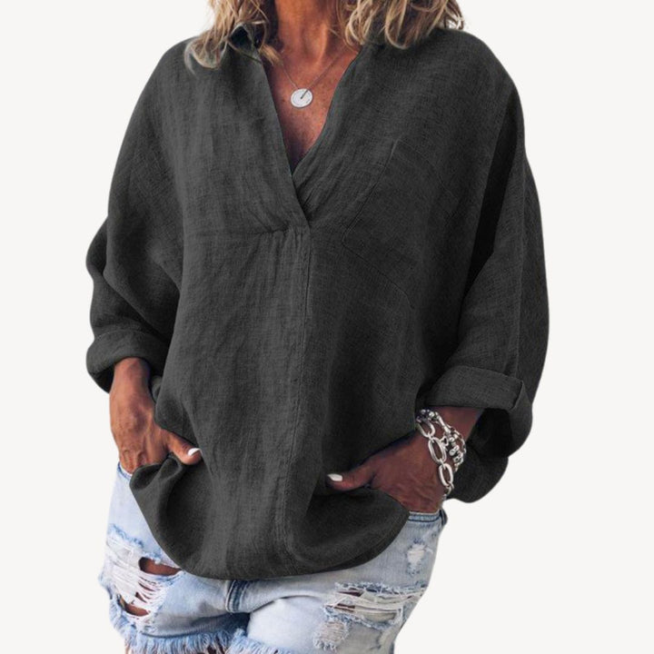 Blouse oversize femme élégante à col V, manches longues. Idéale pour un look chic et décontracté.