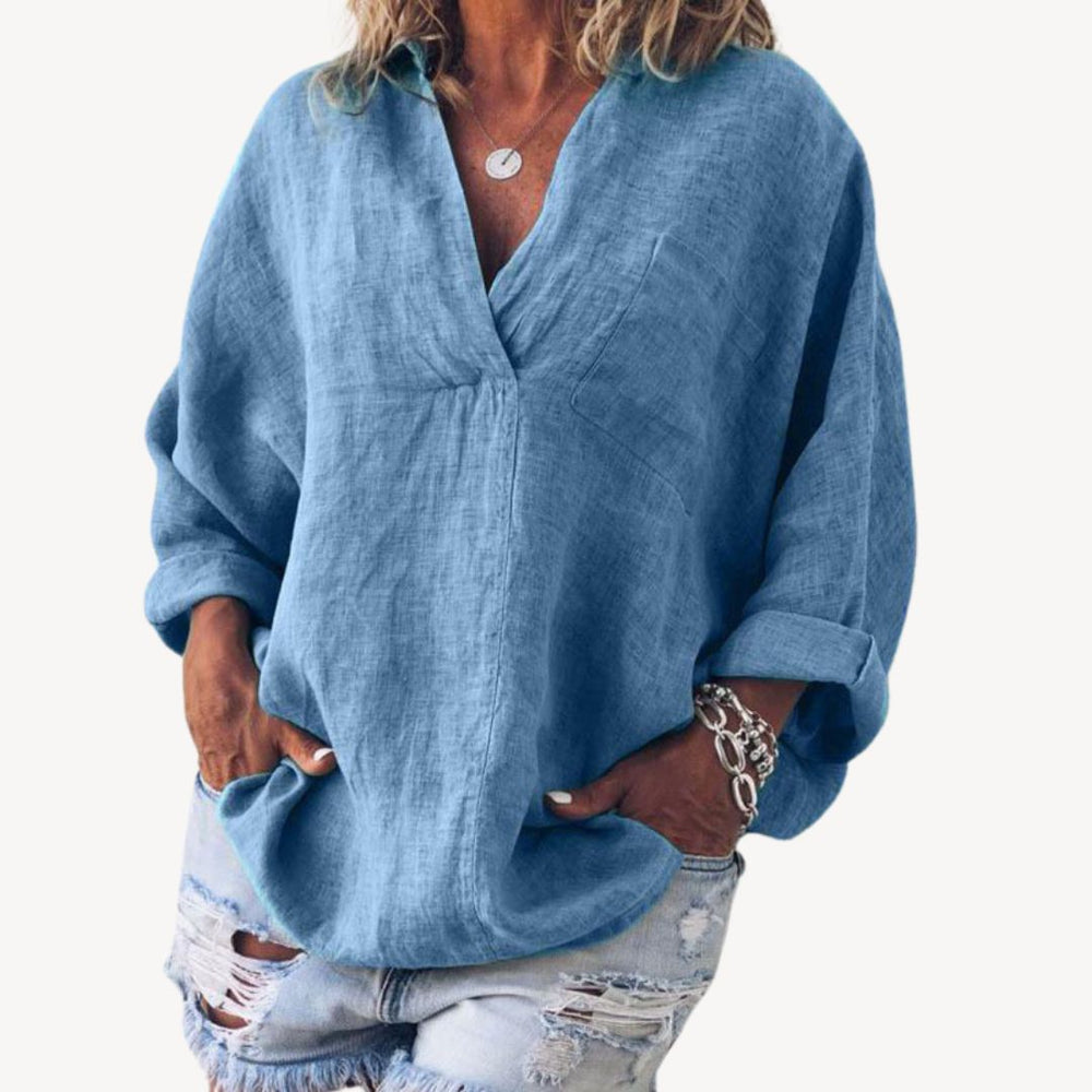 Haut femme chic fluide, blouse oversize col V. Parfait pour mode décontractée, style élégant et confortable.