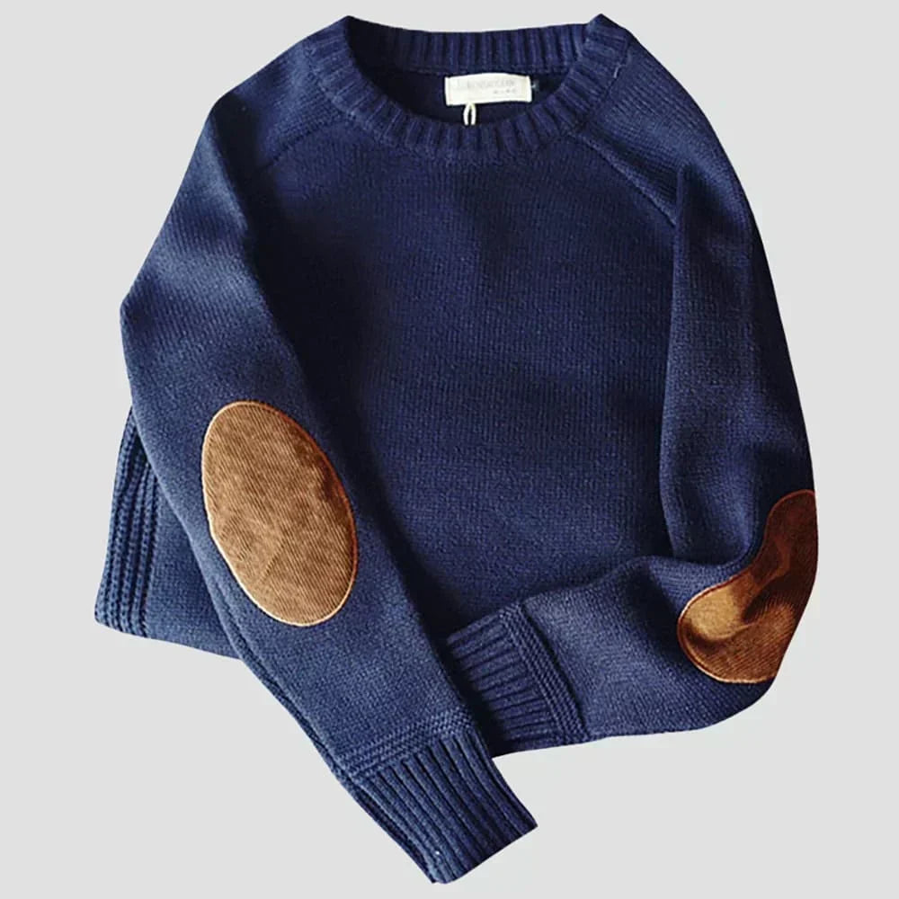 Pull élégant pour homme, modèle classique avec col rond et patches aux coudes, un vêtement polyvalent pour toute occasion.