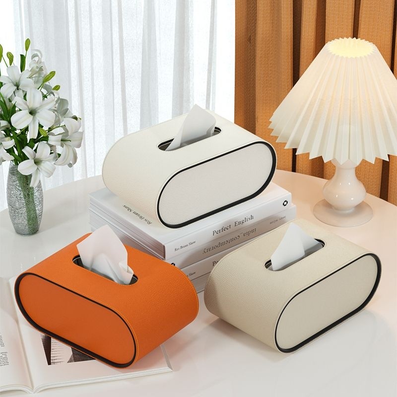 Boîte à mouchoirs ovale élégante, un accessoire de rangement et décoration essentiel pour bureau et salon.