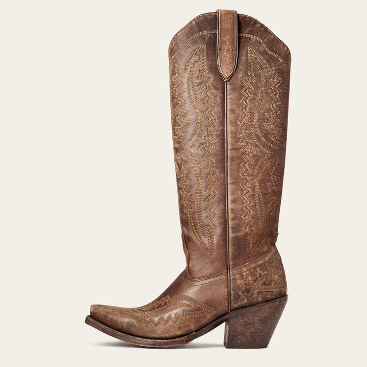 Bottes de cow-boy femme brodées, détails western, tige haute élégante. Style unique et tendance mode.