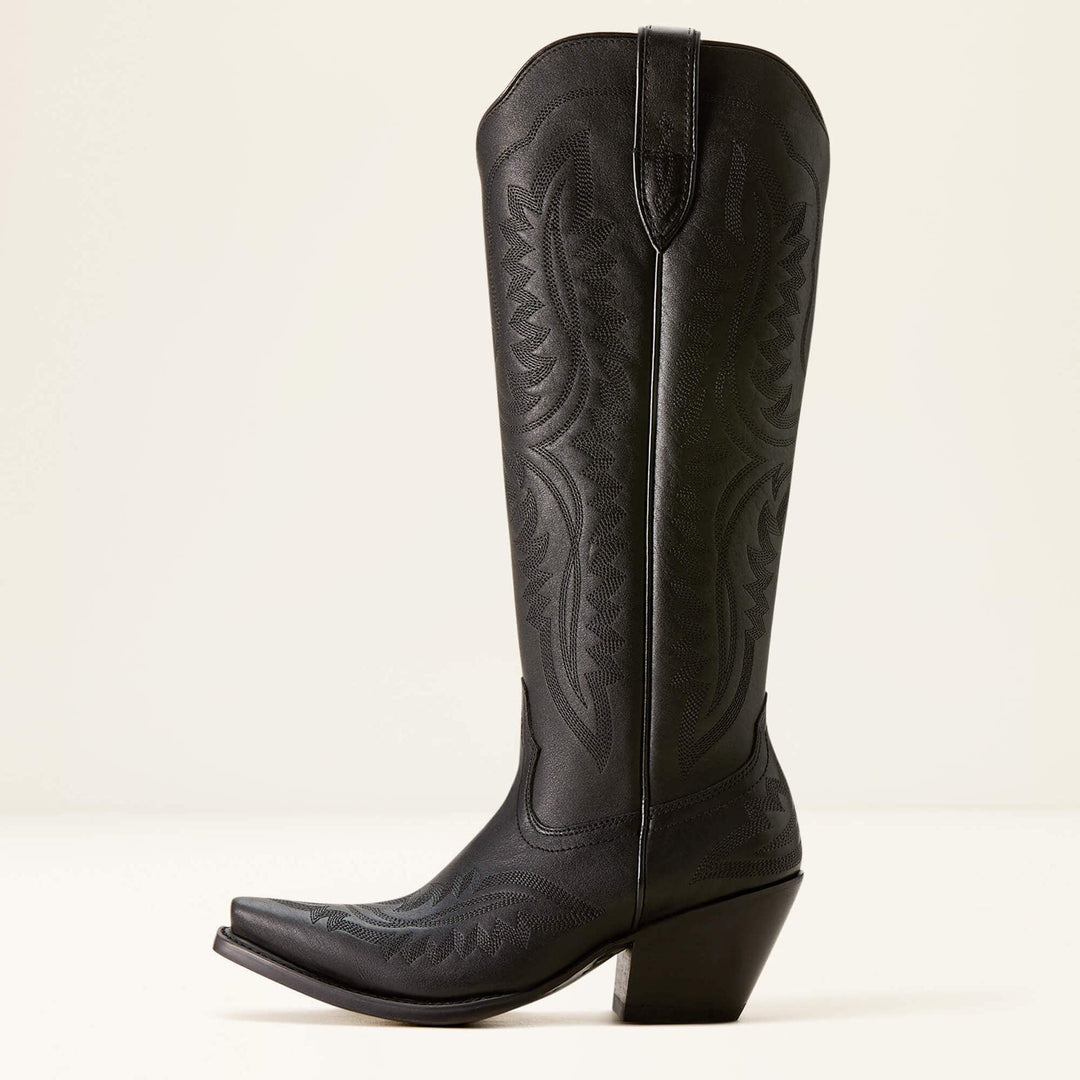 Élégantes bottes cow-boy femme brodées, tige haute western. Chaussures tendance mode avec talon large.