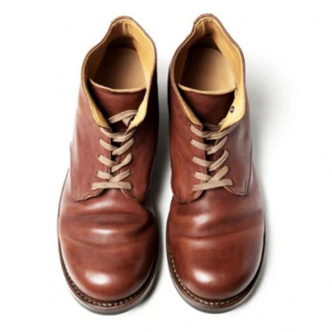Bottes homme marron, design sophistiqué pour un confort optimal et un style affirmé et moderne.