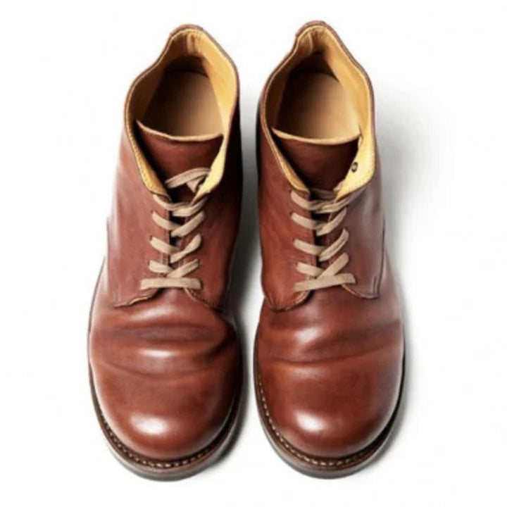 Bottes homme marron, design sophistiqué pour un confort optimal et un style affirmé et moderne.