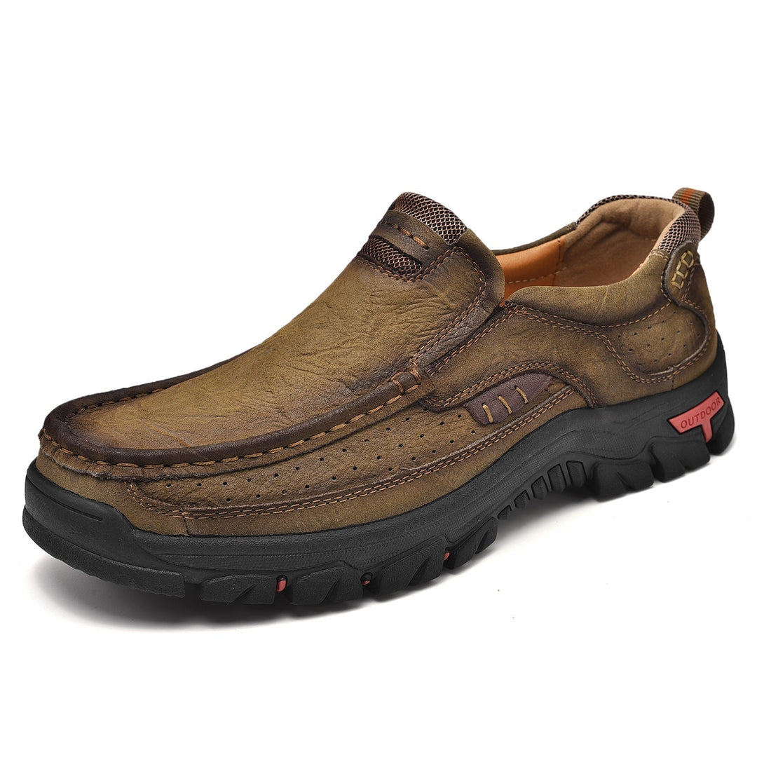 Bottines homme avec adhérence fiable, assurant un confort orthopédique et un soutien postural optimal.