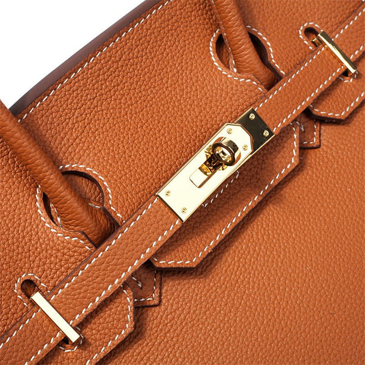 Sac bandoulière classique en cuir, spacieux et pratique pour tous vos effets.