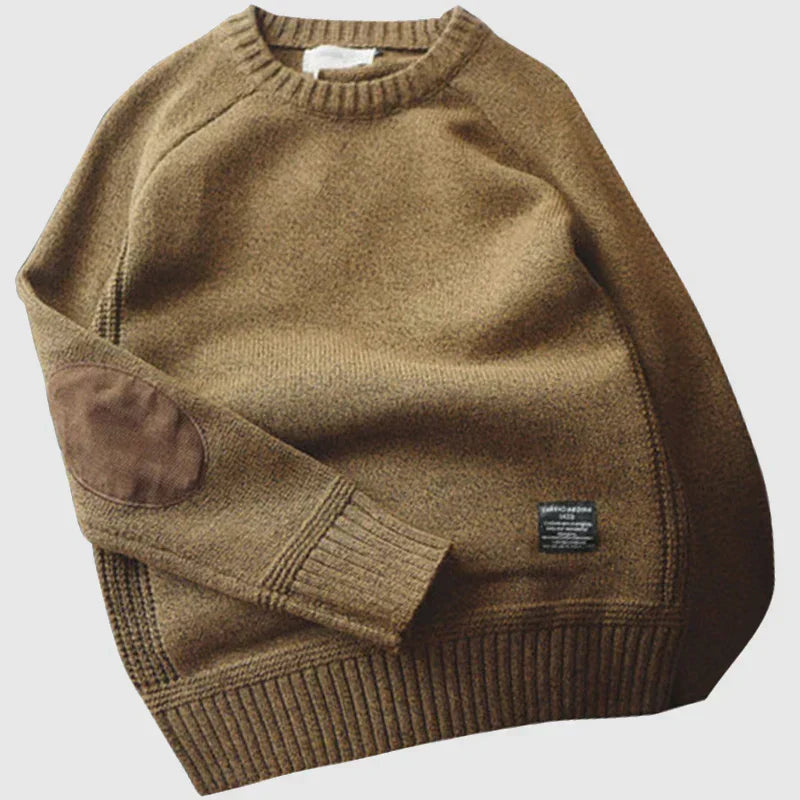 Vêtement homme chaud et confortable, ce pull d'hiver avec patches aux coudes est idéal pour affronter le froid.
