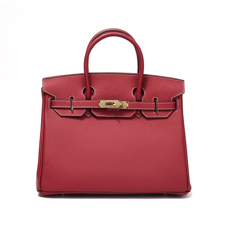Sac à main en cuir, avec bandoulière amovible, polyvalent et fonctionnel.