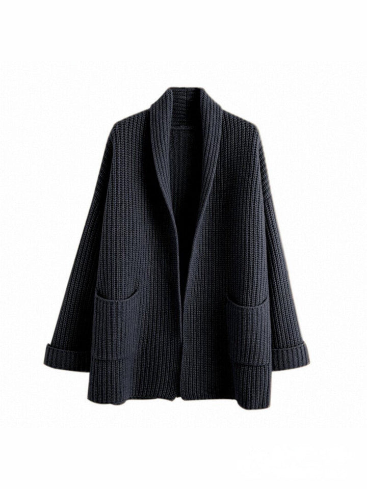Cardigan femme noir décontracté, coupe ample et confortable. Parfait pour superposer et rester au chaud.