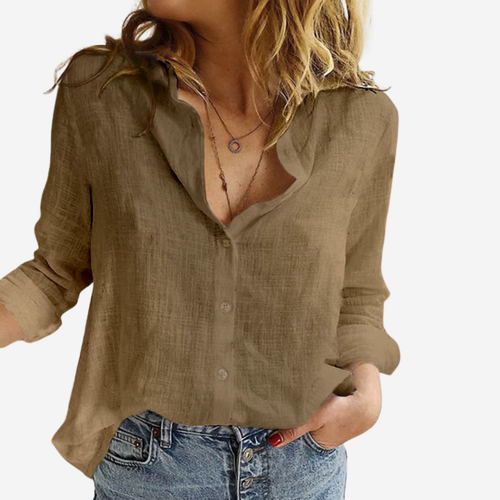 Chemise femme élégante, coupe fluide et décontractée, parfaite pour un style chic ou une tenue casual.