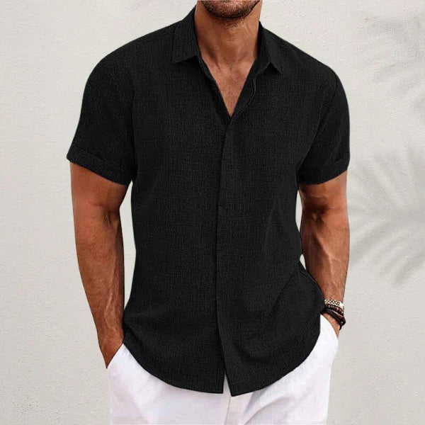 Chemise homme élégante à manches courtes pour l'été, coupe décontractée, tissu léger et respirant. Idéale pour la mode masculine.