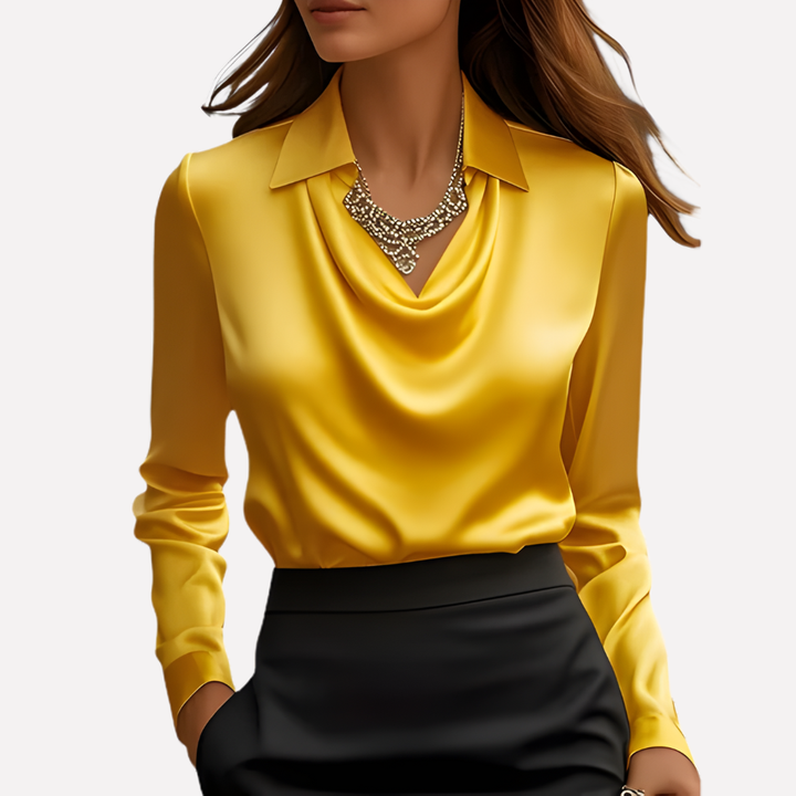 Chemisier femme élégant et fluide, avec un col drapé moderne, idéal pour un look chic.