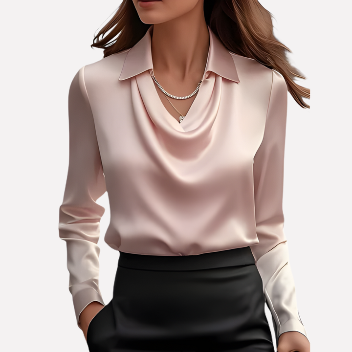 Chemisier femme à design drapé distinctif, manches longues, création mode élégante.