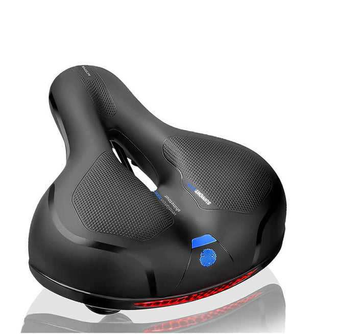 Selle de vélo rouge fluorescente unisexe, assure confort et sécurité en cyclisme VTT et sur route.
