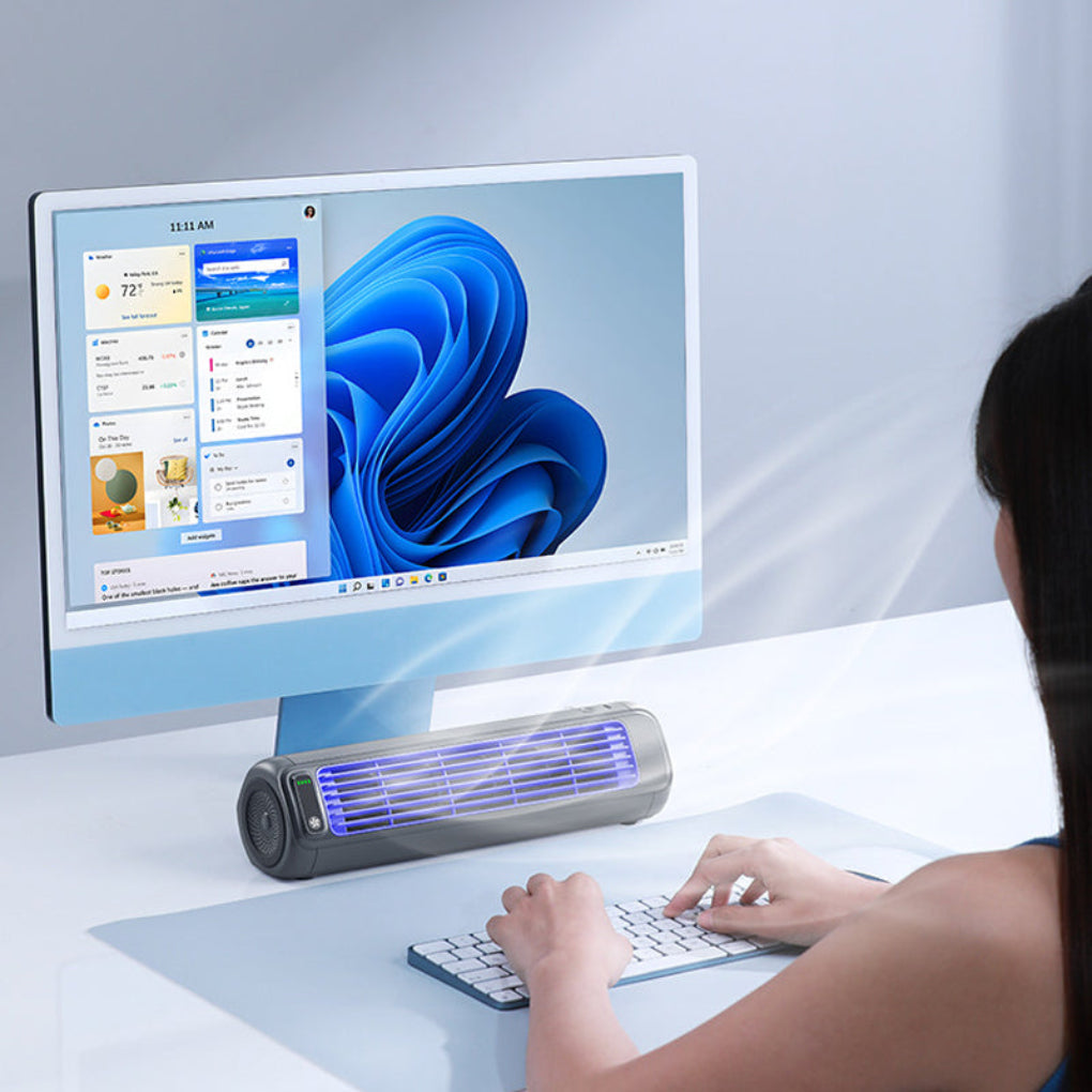Climatiseur d'appoint portable, design moderne et compact, pour bureau, chambre ou salon.