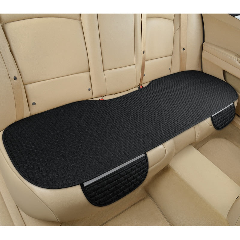 Coussin de siège auto universel en lin naturel, respirant, antidérapant, pour confort et protection.