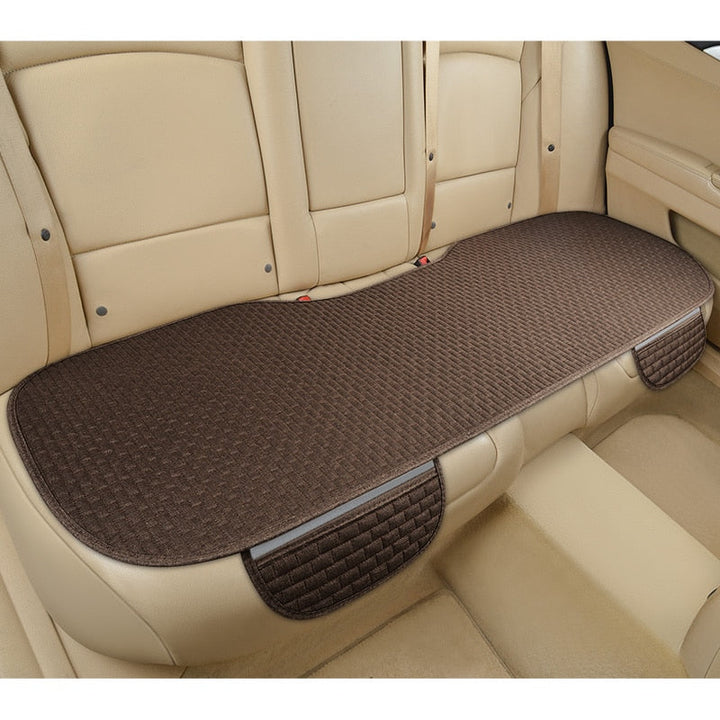 Coussin de siège auto universel antidérapant en lin, protection et confort pour toutes voitures.