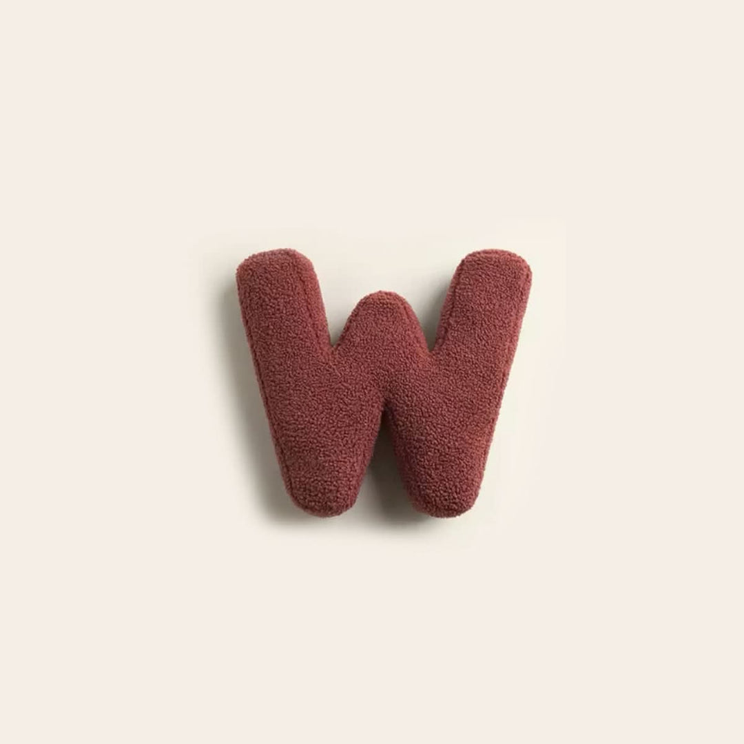 Coussin personnalisé W, ajoute du caractère unique à votre canapé ou lit.